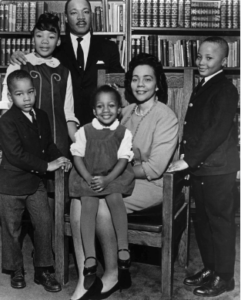 Image of Dexter King as a child, alongside his parents